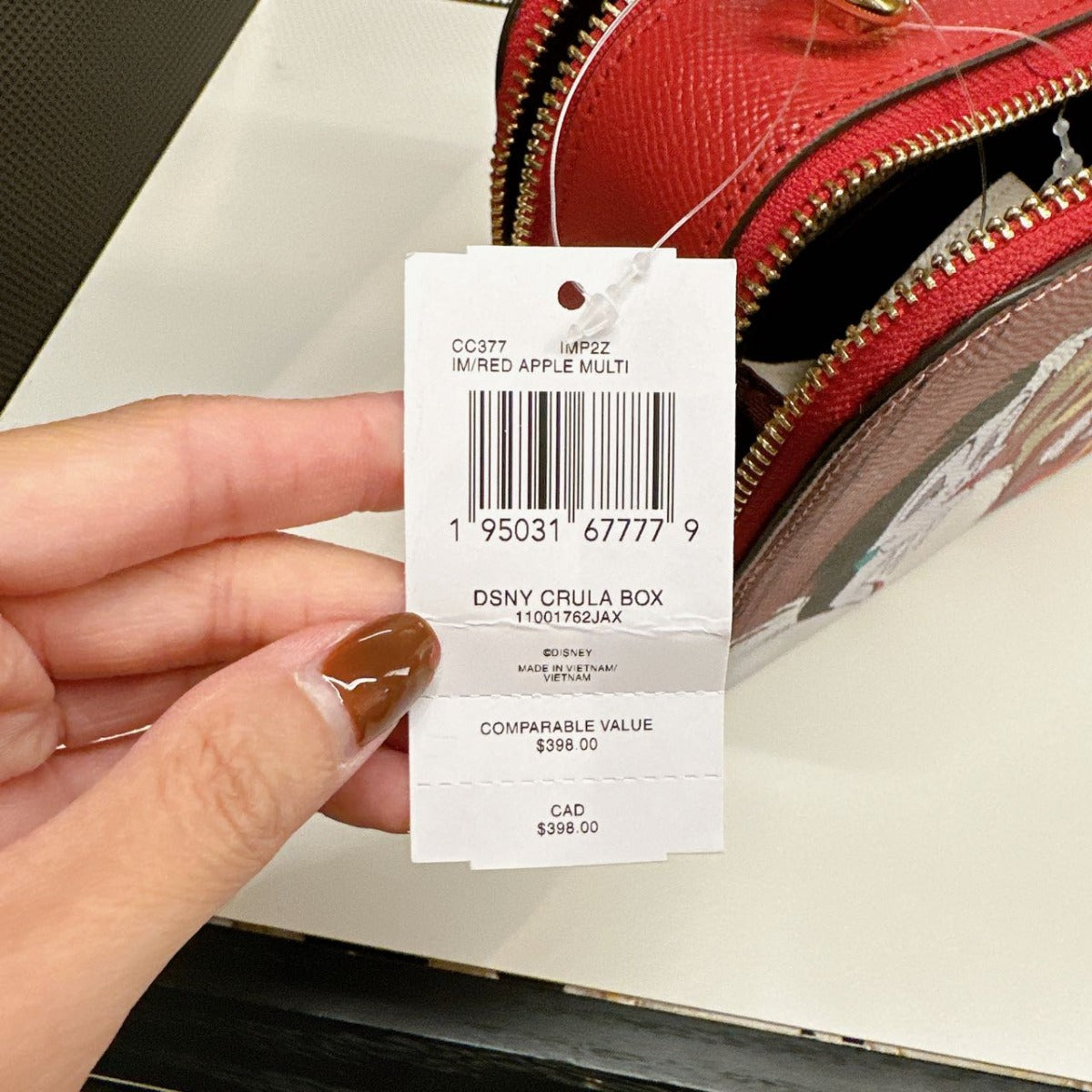 Coach CC377 Disney X Coach Box Crossbody With Cruella Motif IM/Red Apple Multi Coach CC377 Disney X Coach Box Crossbody With Cruella Motif IM/Red Apple Multi
